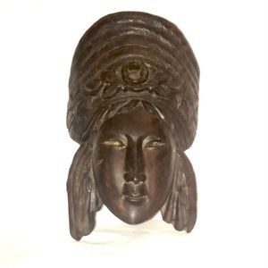 Carved head of Lord Shiva Nataraga.
